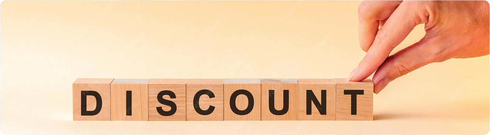 Wooden blocks spelling DISCOUNT